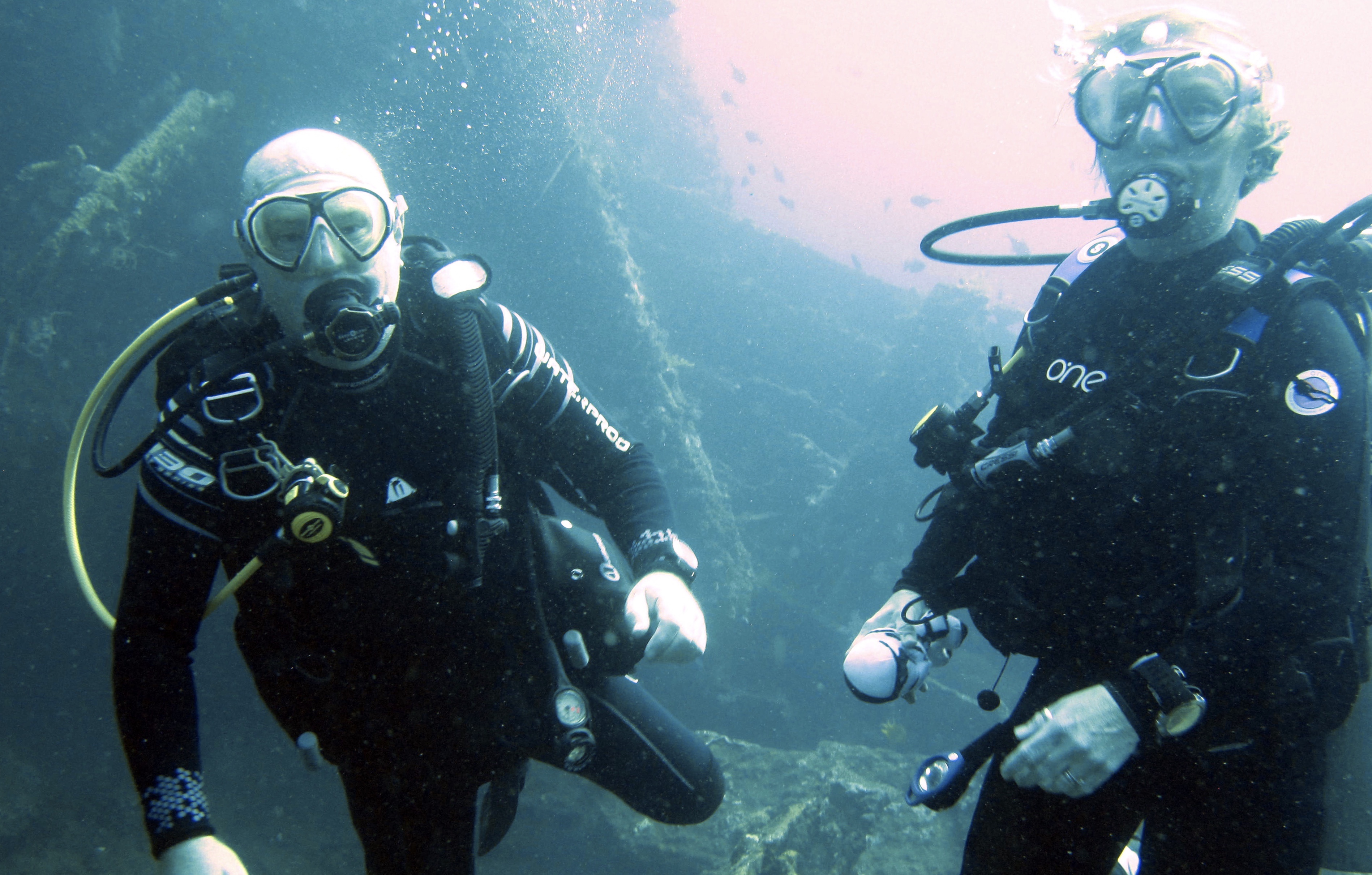Martin and Emma scuba diving on the USAT Liberty shipwreck in Tulamben, Bali