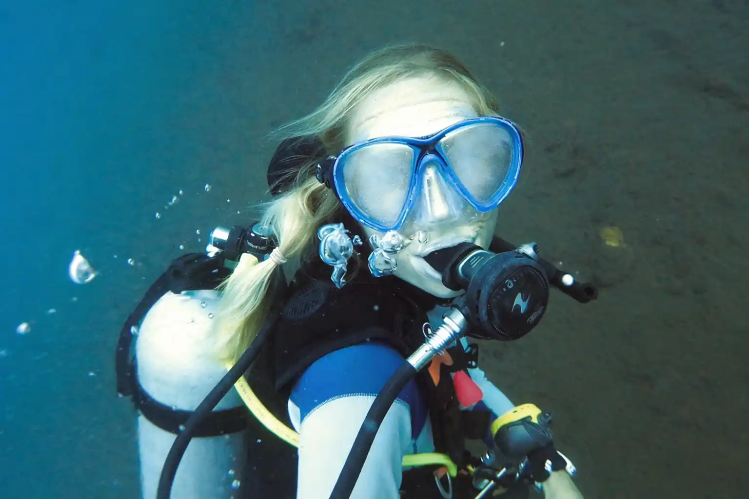 Dive problems underwater - a scuba diver with a foggy mask